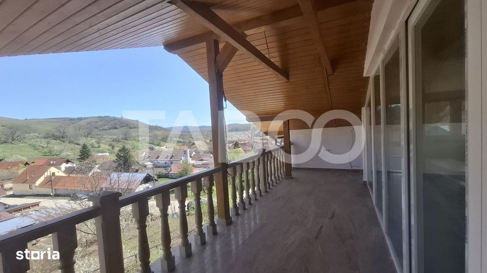 Casa de vanzare 405 mp utili 2 garaje 250 mp terase Slimnic Sibiu
