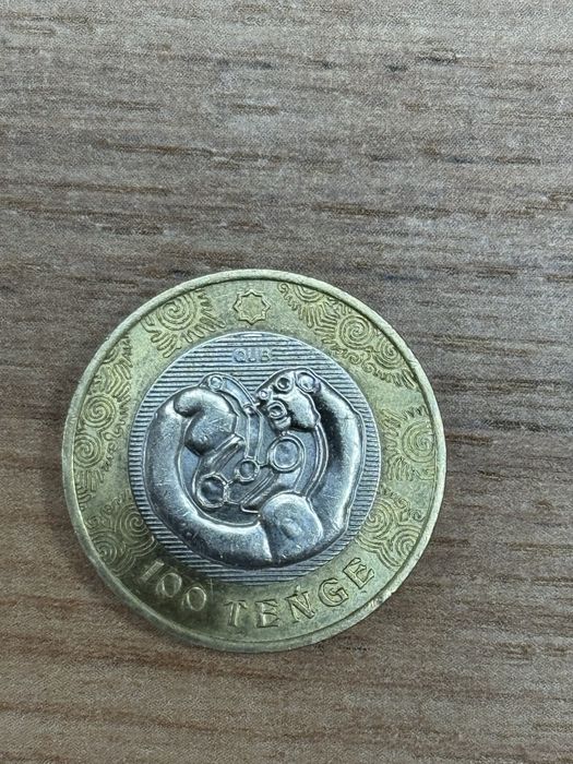 Монета 100 тг сакский стиль