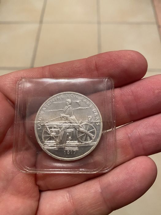 Серебрянная монета 20 евро.