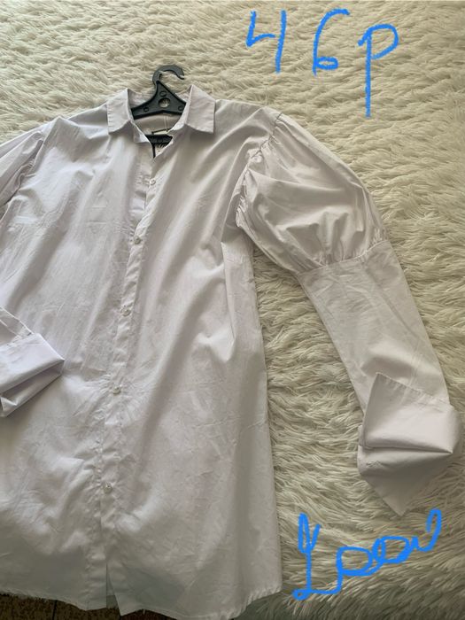 Распродажа одежды и обуви.