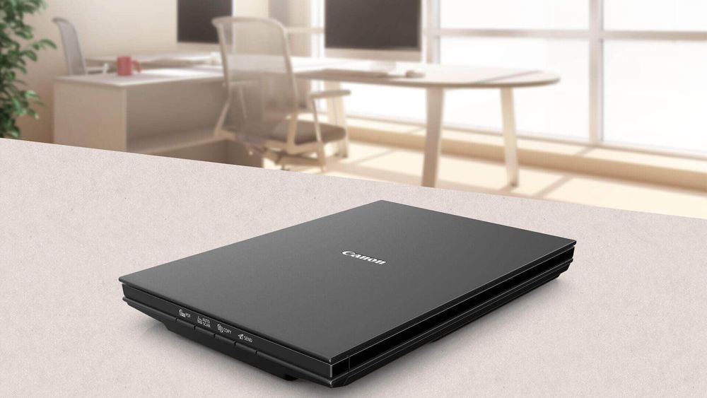 Сканер Canon Lide 300 перечисление есть