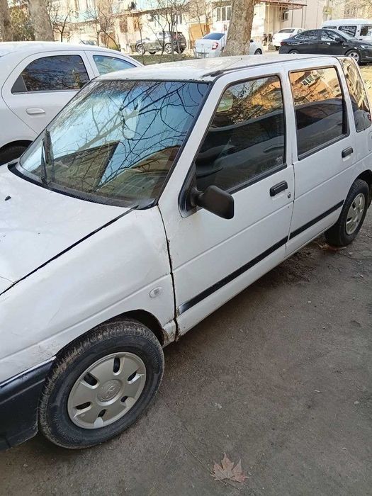 Тико сотилади   1996 йил  ок ранг.  Мотор килинган . Газ йук