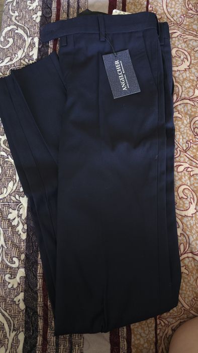 Брюки школьные Angelcher 176р