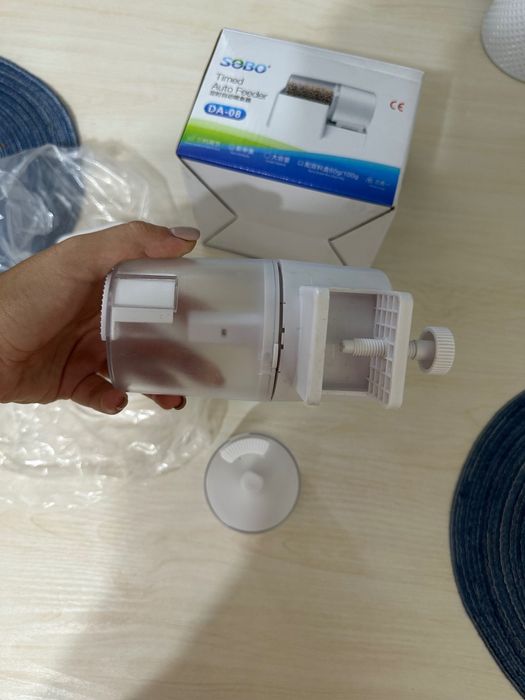 автоматическая кормушка для рыб и птиц