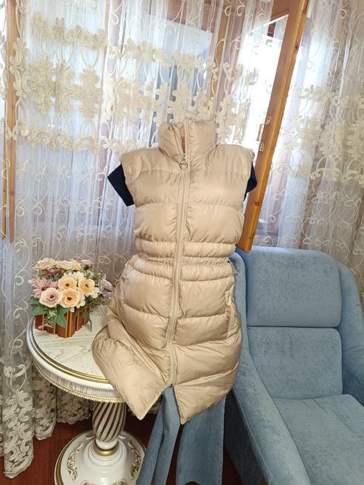 Новая дутая жилетка.