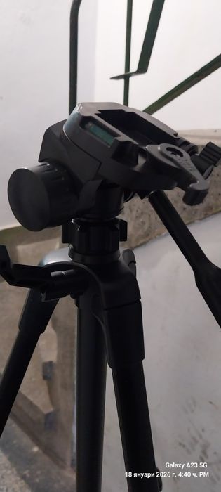 Трипод Стойка за цифров фотоапарат.