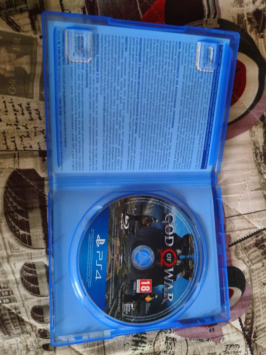 Диск на PS4 God of waR