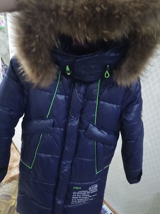 Продам пуховик 10-12 лет