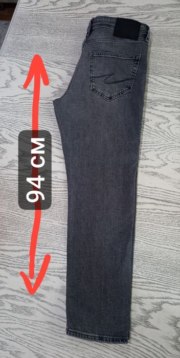 Новые джинсы Colins