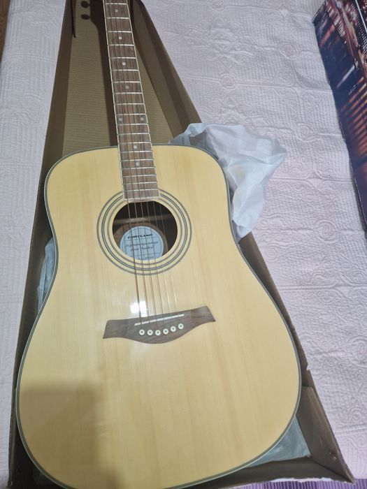 Акустическая гитара