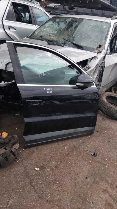 Usa stanga/dreapta fata Volkswagen Tiguan an 2009