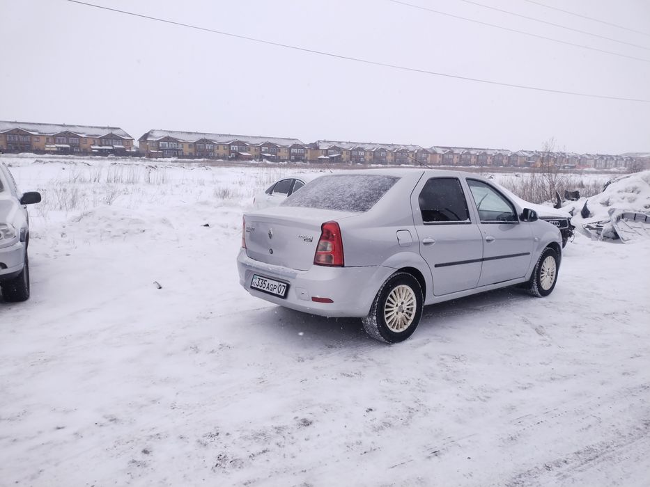 Автомобиль Рено Логан 1
