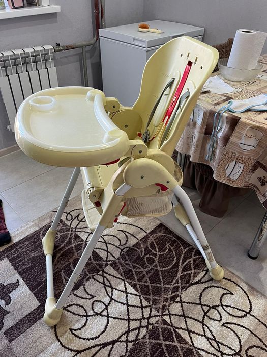 Продам коляску и стульчик для кормления