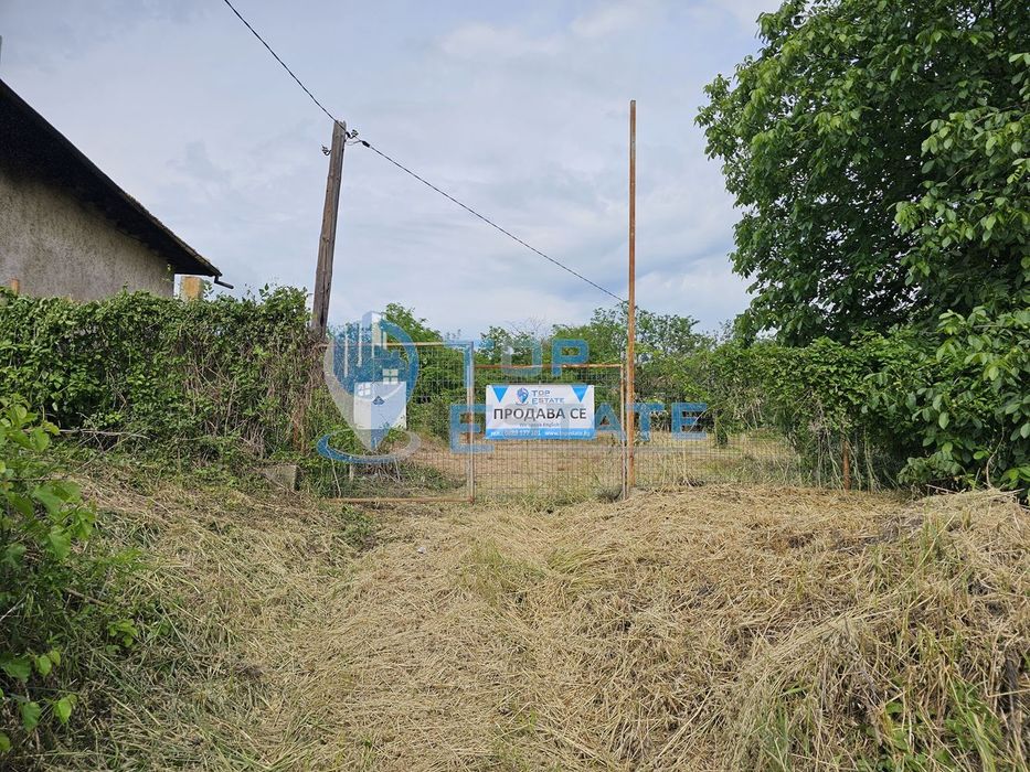 Парцел в регулация на главен път Русе - В. Търново в село Поликраище,