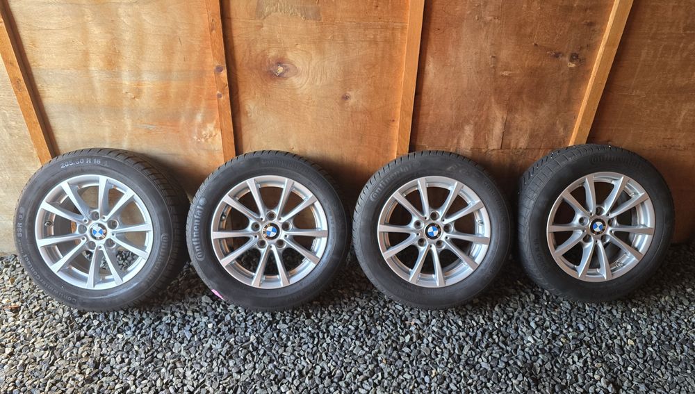 Set jante BMW originale 16 cu anvelope Continental M + S  205/60 R16