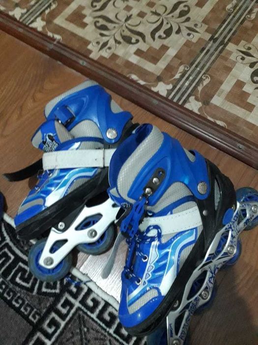 Роликовые коньки