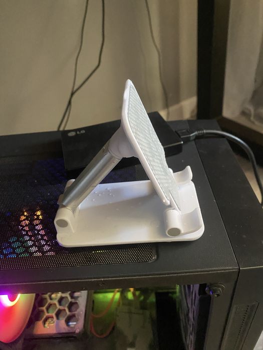 Подставка для телефона джостика.