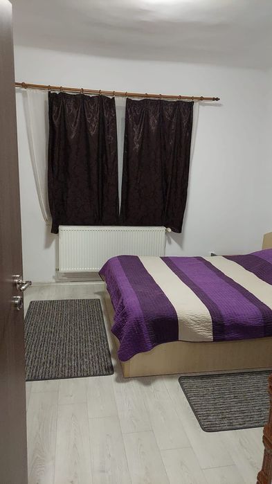 Apartament o camera la casa