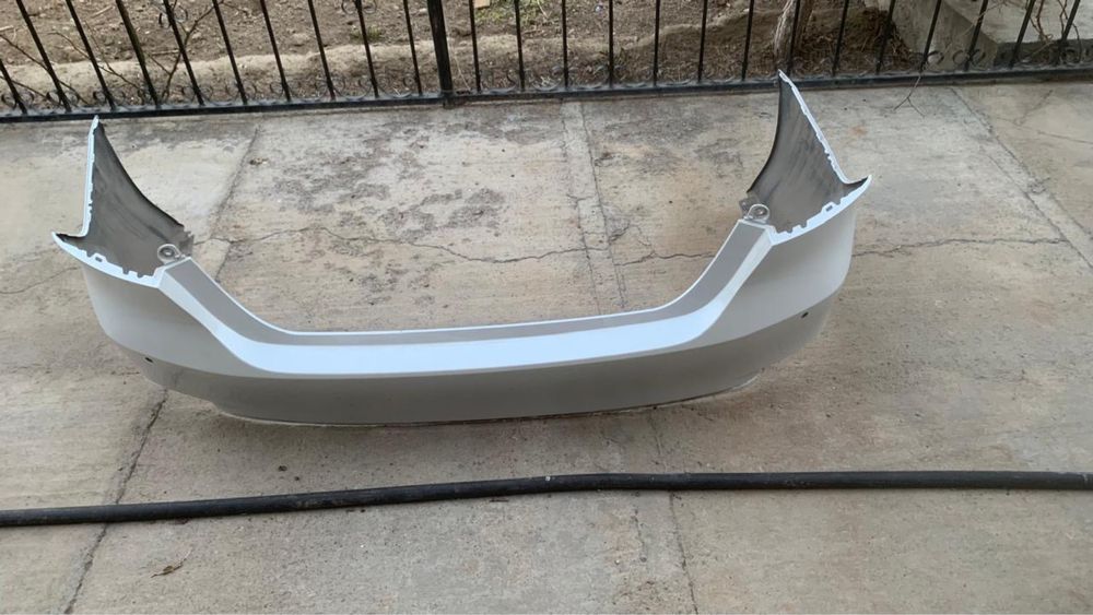 Заданий бампер в оригинале от Камри 70