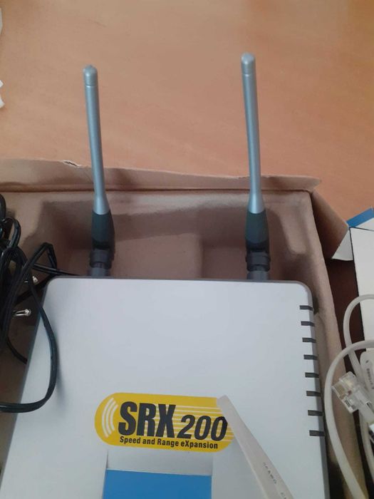 Рутер Linksys, 2,4GHz,с четири кабелни изхода.