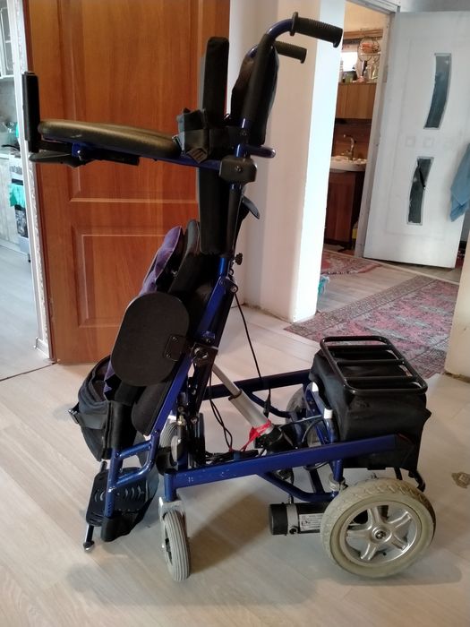 Электрическая инвалидная коляска