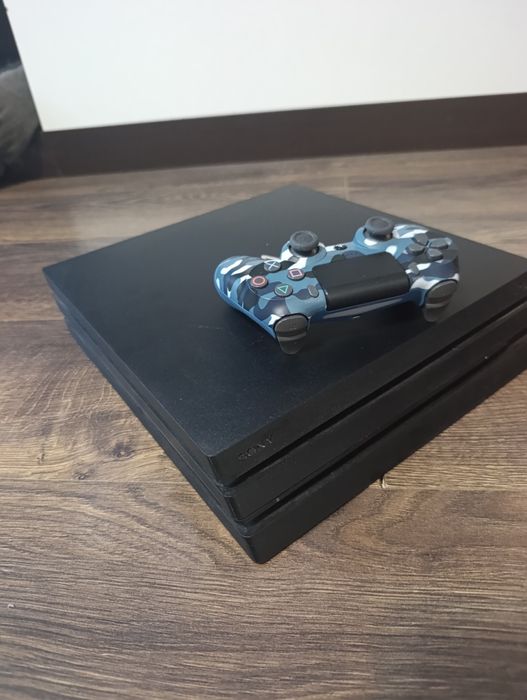 Consola PS4 PRO + 16 jocuri