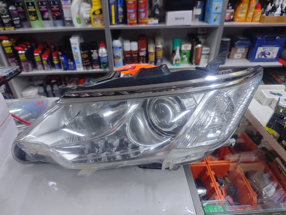 Фара Toyota Camry 55 R4 левая.