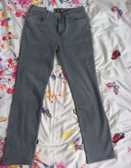 Vând pantaloni lee King of indigo