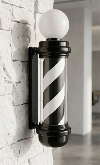 Въртящ се светещ бръснарски стълб.Barber  pole