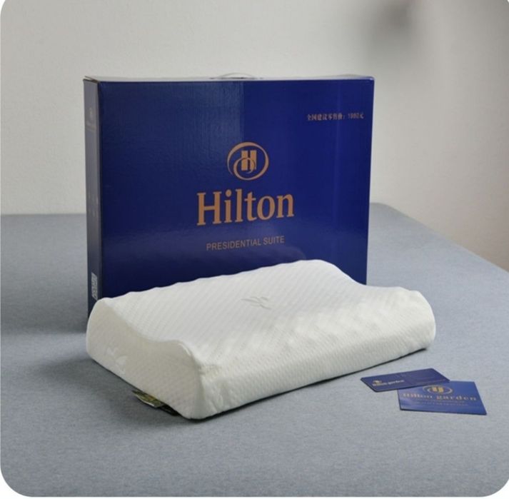 Hilton пуховая или ортопедичес,кая подушка.