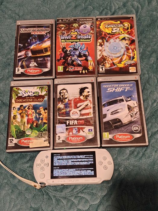 PSP E1004 modat si cu 12 mini DVD jocuri