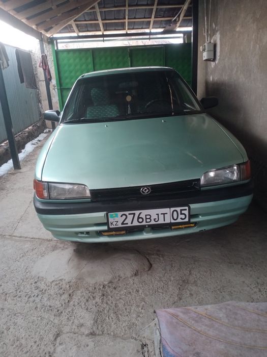 Мазда 323 сатылады журип тур
