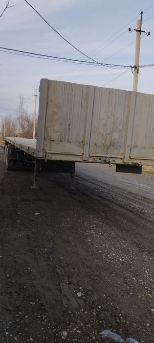 Маз полуприцеп сотилади.