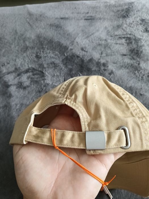 Tommy Jeans șapcă unisex bej/crem cu logo mic mărime OS noua originala