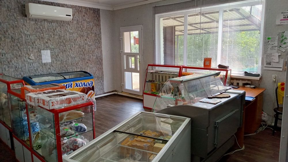 Шпальный дом с магазином