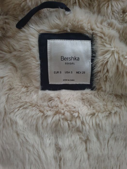 Плащь кожанный с мехом.