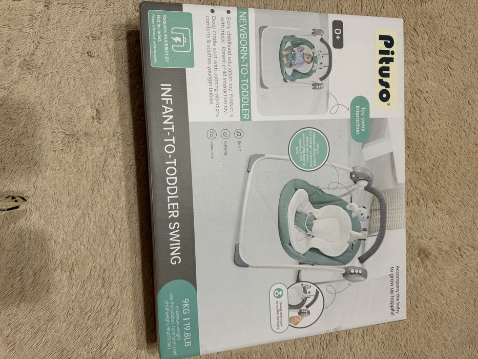 Качеля для младенца (электрическая)