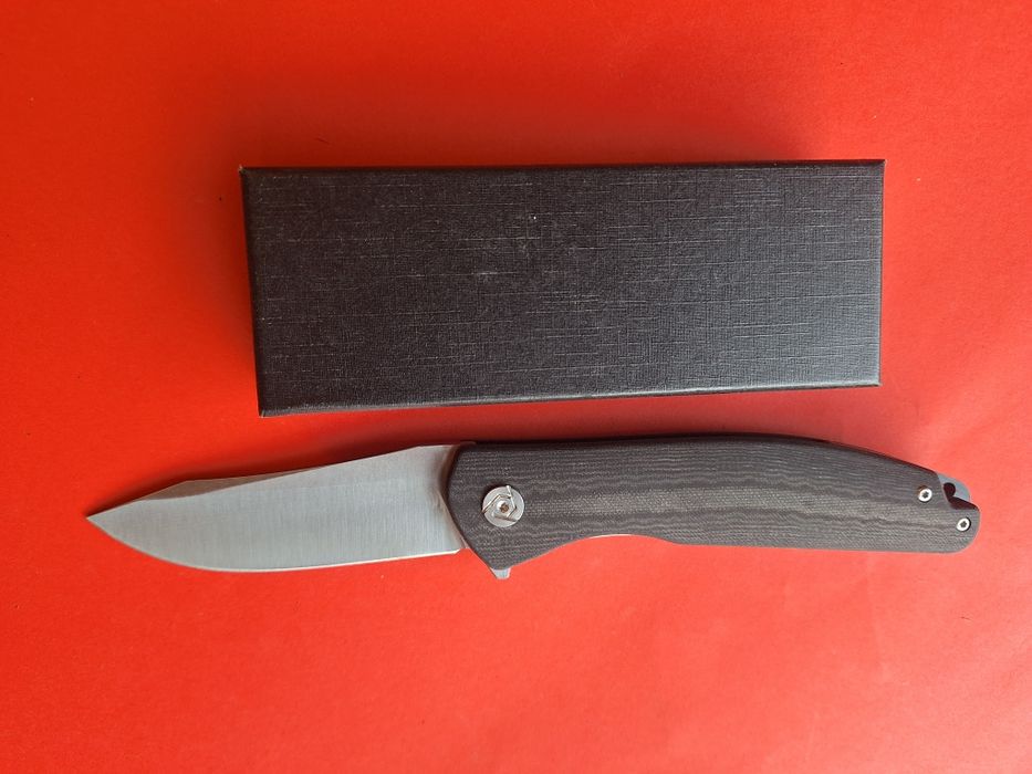 Сгъваем нож-стомана D2,дръжка G10