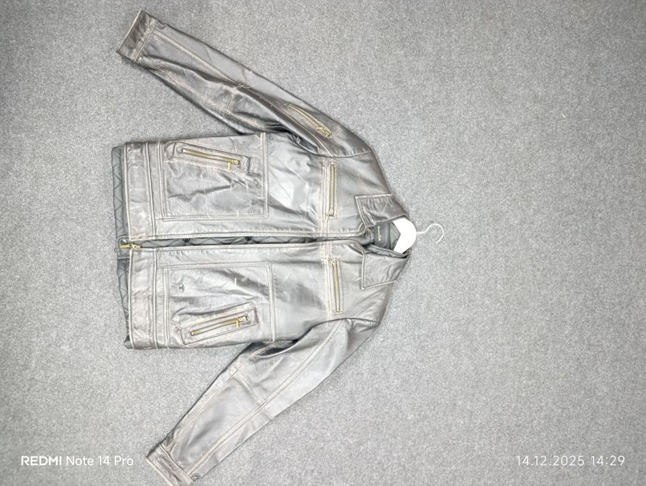 Кожаная куртка новый .