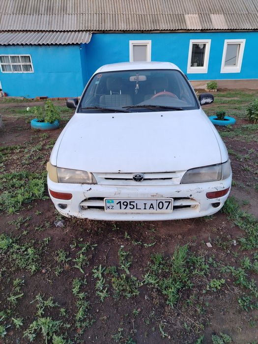 Тойота корола е100