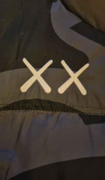 Geaca The north face x kaws