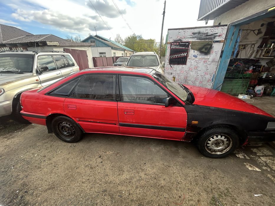 Машина Mazda 626