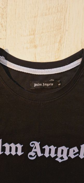 Tricou negru Palm Angels marimea L, merge la un M.
