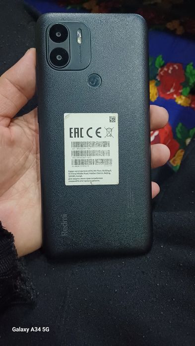 Редми А2 телефон