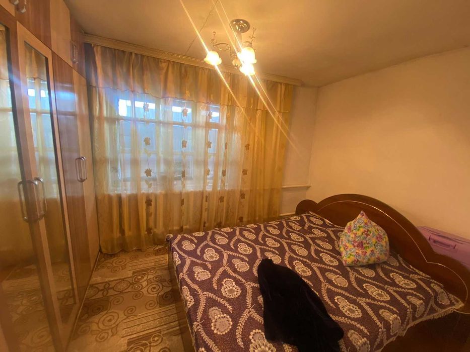 Дом на Бугре, Танат Империя