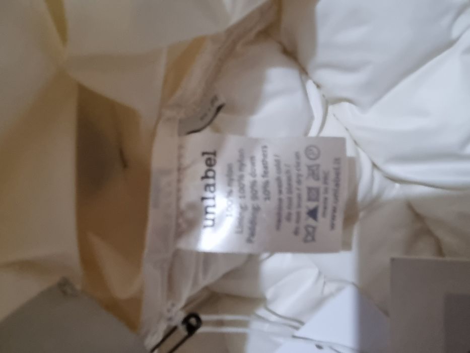 Продам пуховик новый