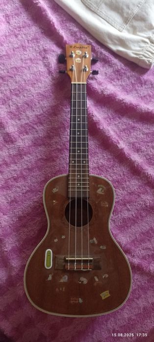 Окулели мини гитара