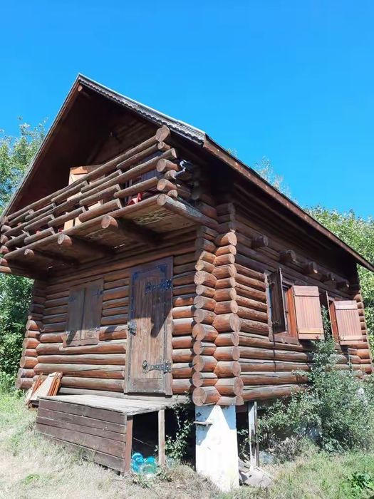 Casa din lemn rotund 60mp cu relocare și montaj inclusa în preț.