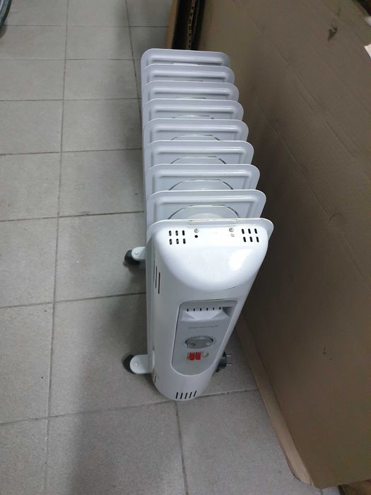 Calorifer electric 9 elementi-doua trepte-2000w-import