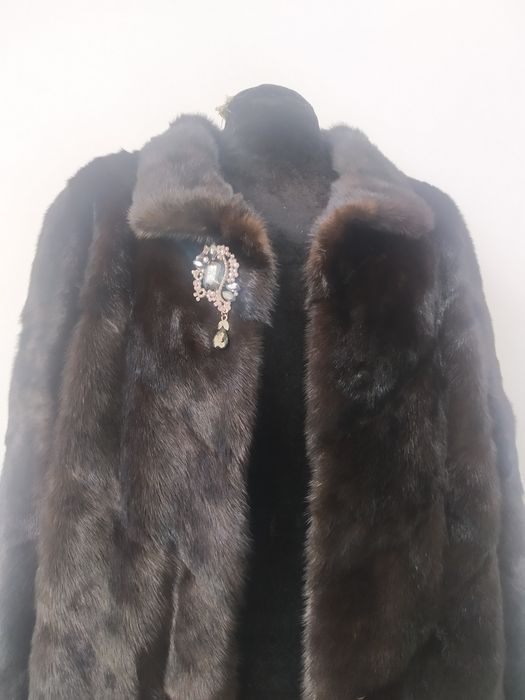 Натуральные норковые шубы большого размера.